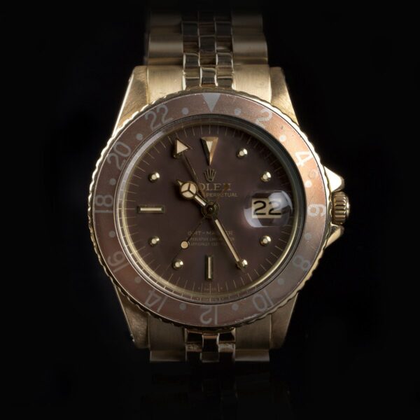 Photo of Immaculate Rolex GMT 1675 18k Gold Nipple Dial Faded Bezel