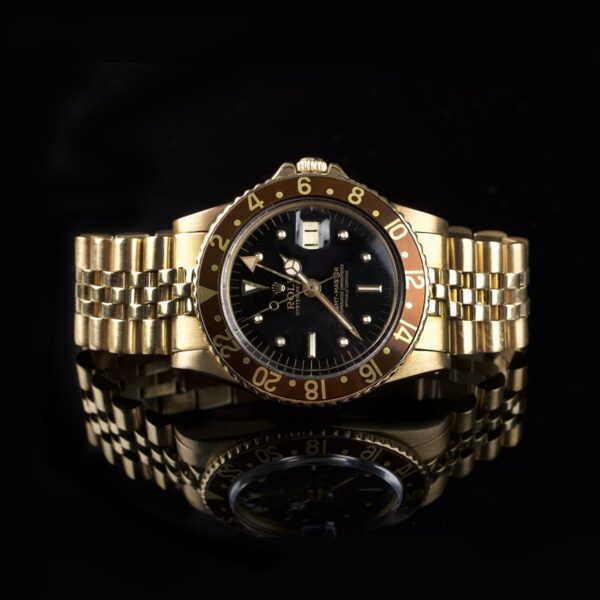 Photo of Stunning Rolex GMT 1675 18k Gold Nipple Dial Tobacco Bezel
