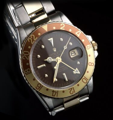 Photo of Rolex GMT-Master Gold Steel 1675 Nipple Dial