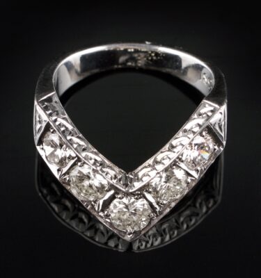 Photo of white gold ring with 5 diamonds