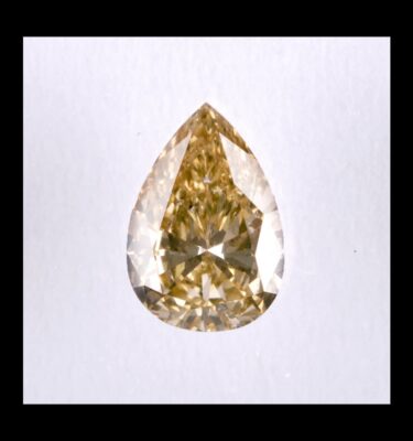 Photo of diamond pear fancy light orangy brown