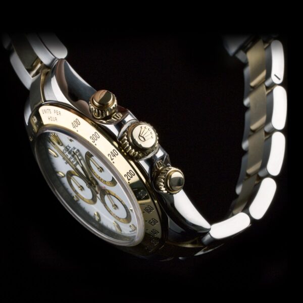 Photo of watch Rolex Daytona ref 116523 gold steel white dial