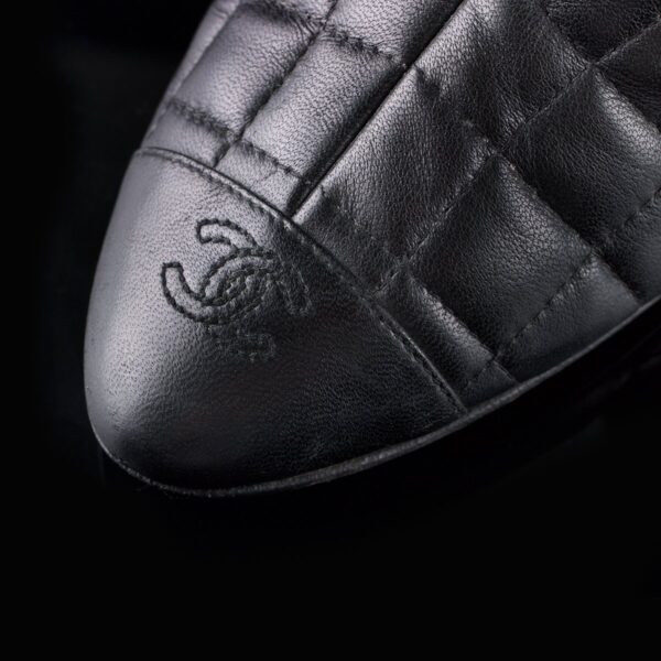 Photo of Chanel black quilted boots